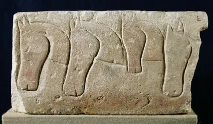 Lintel with a relief depicting horses heads, from Roqueperteuse